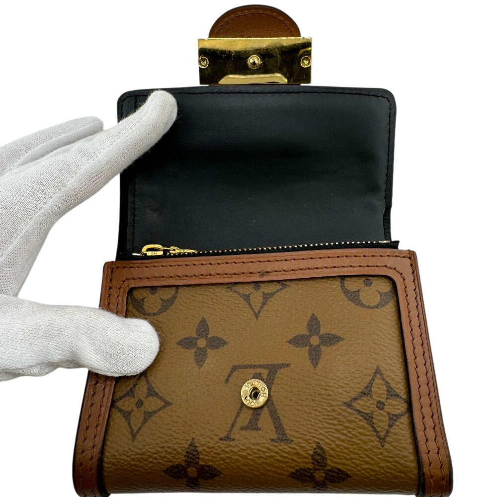 LOUIS VUITTON Tri-fold wallet M68725 leather Brown Monogram reverse Portefeuille Daufine Compact