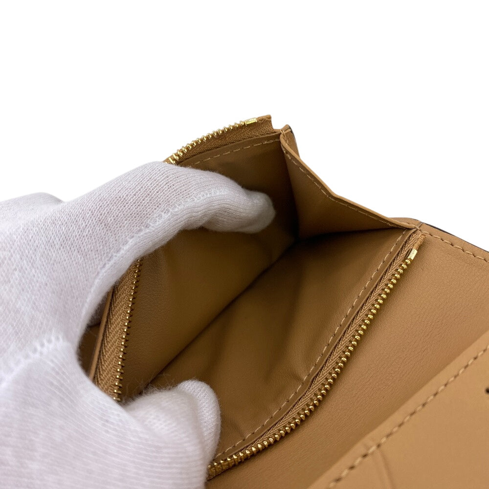 LOUIS VUITTON Bifold Wallet トリヨン Taurillon Clemence black Noir LV Vertical Wallet Compact